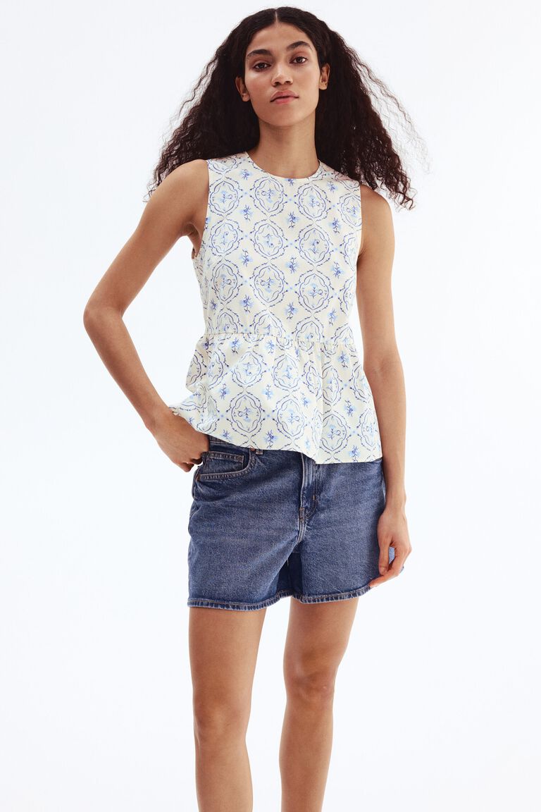 Blus peplum tanpa lengan