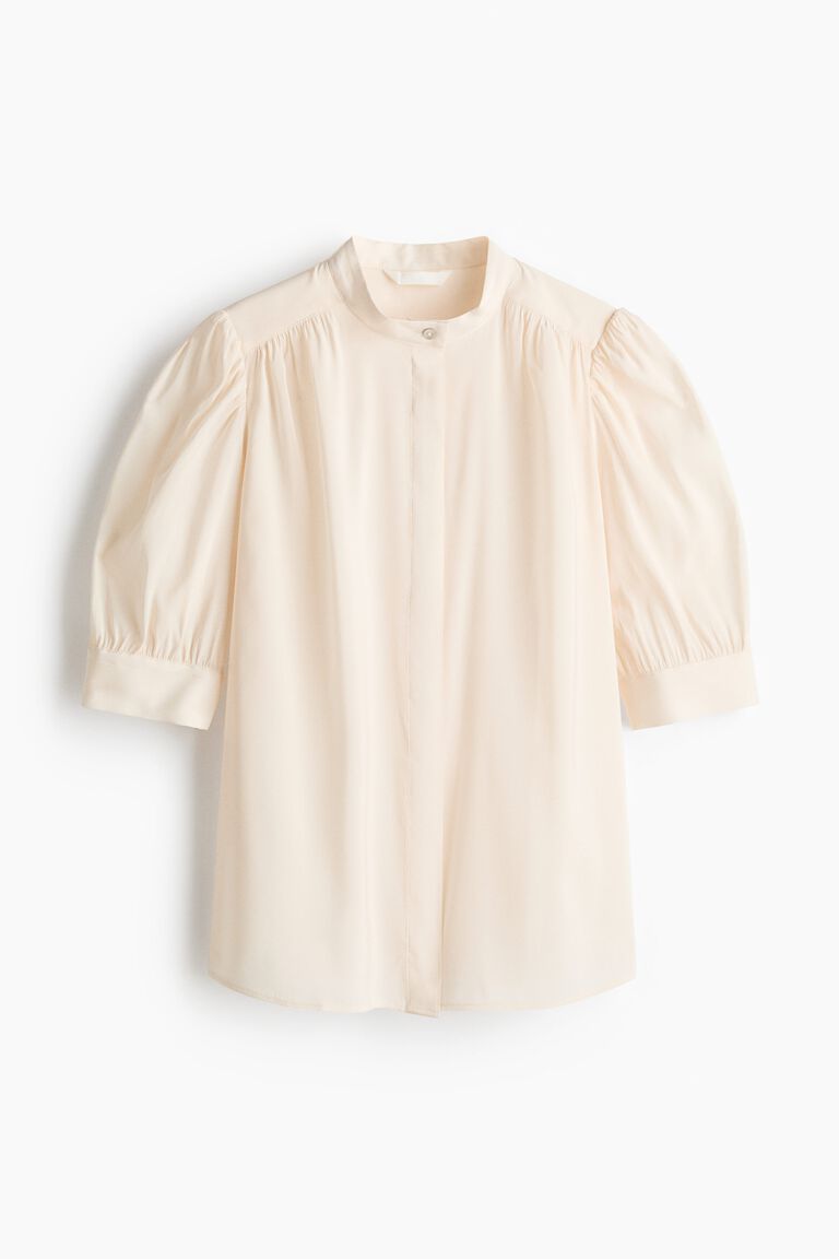 Blus dengan lengan puff