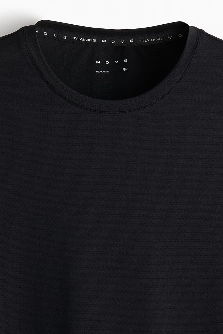 Kaos olahraga mesh dengan teknologi DryMove™